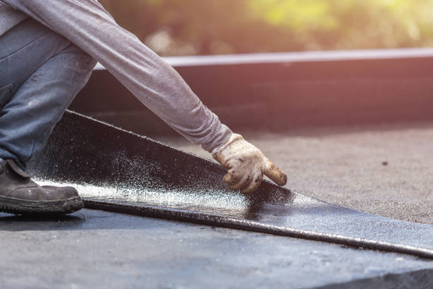 Professional Basement Waterproofing technician working in Melbourne, KY